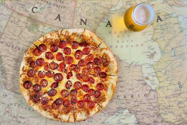 Backcountry Brewing | Pizza and beer on map table top