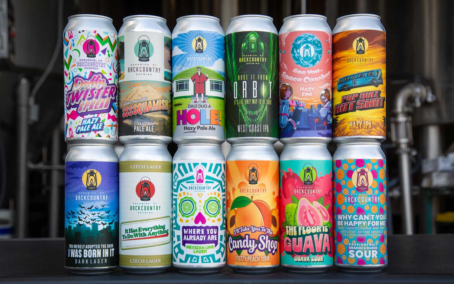 Backcountry Brewing — Image of a stack of 12 limited beer cans from the brewery.